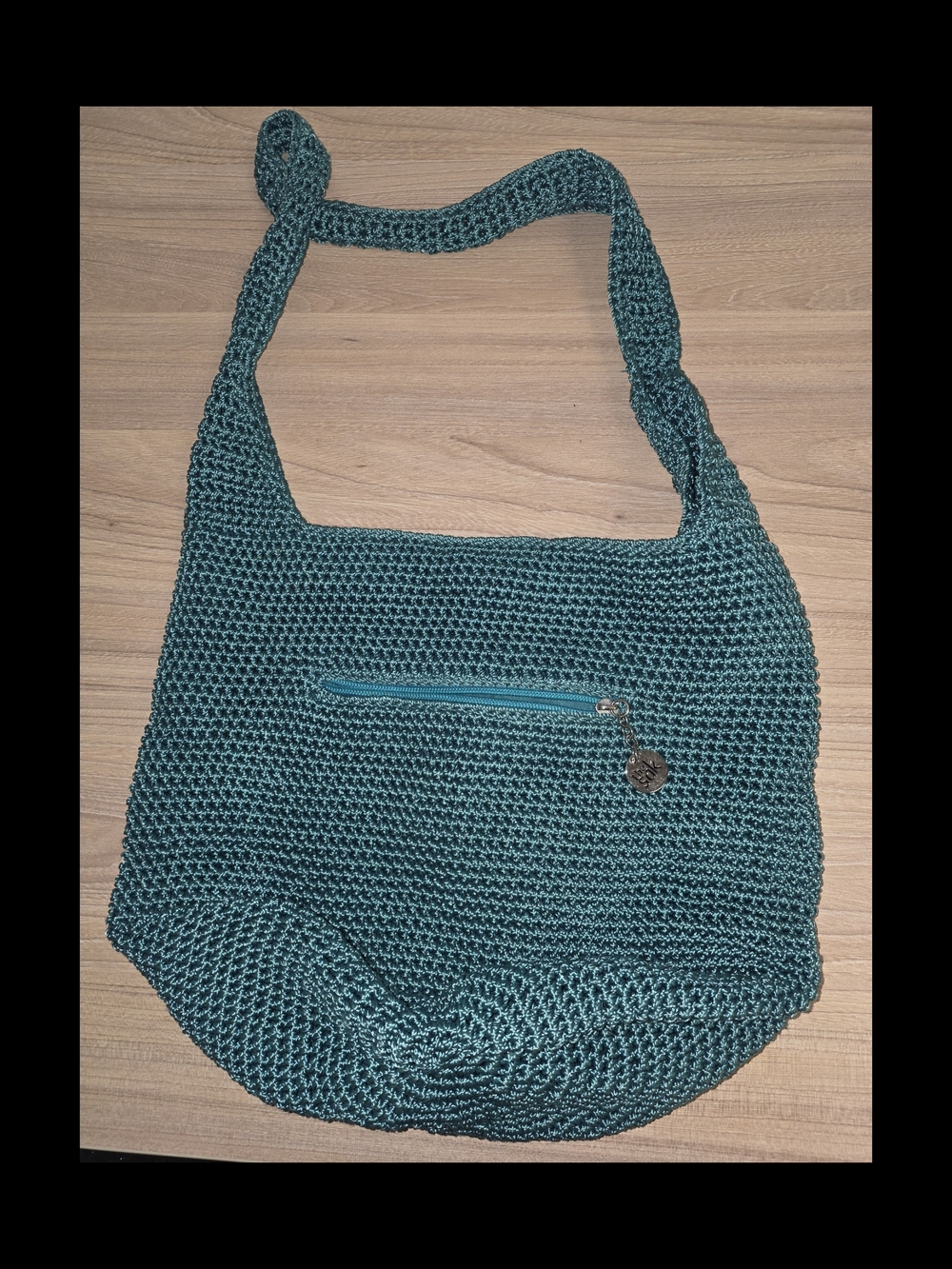 The Sak Teal Crochet Shoulder Bag with Front Zip Detail